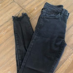 Just black. Frayed ankle length jeans. Black.